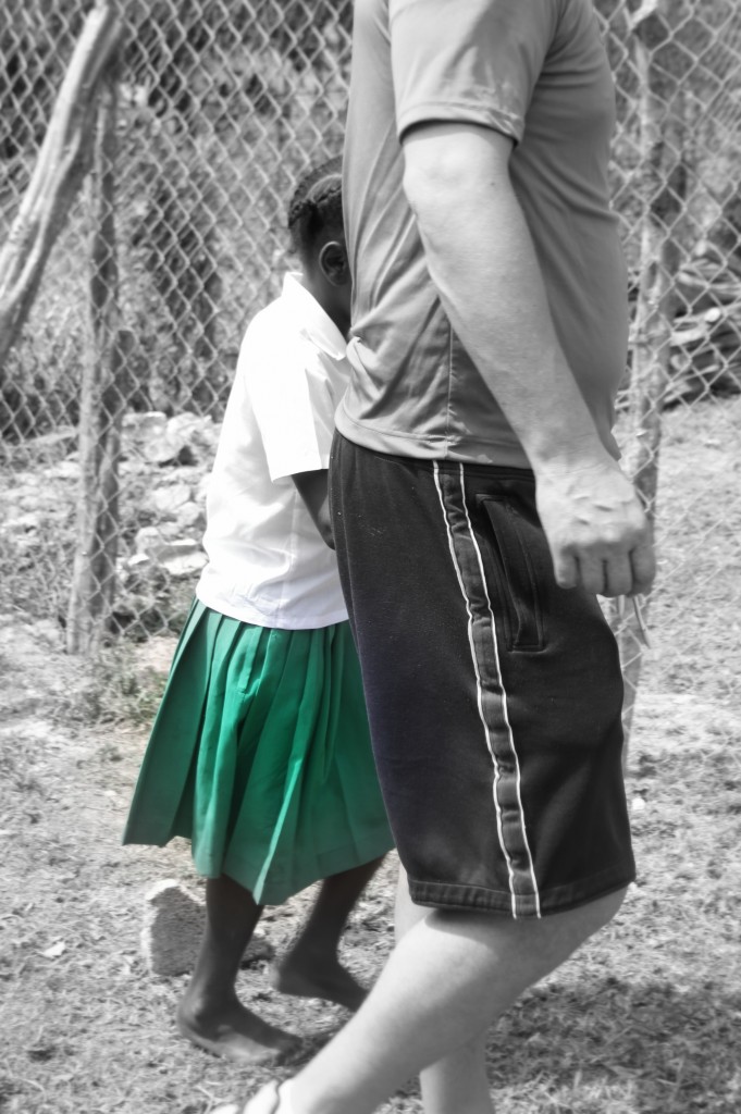 Spending time with the girls at a shelter in Jamaica.